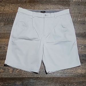 Like new men's size 36 khaki shorts off-white/cream color logo buttons pleaded